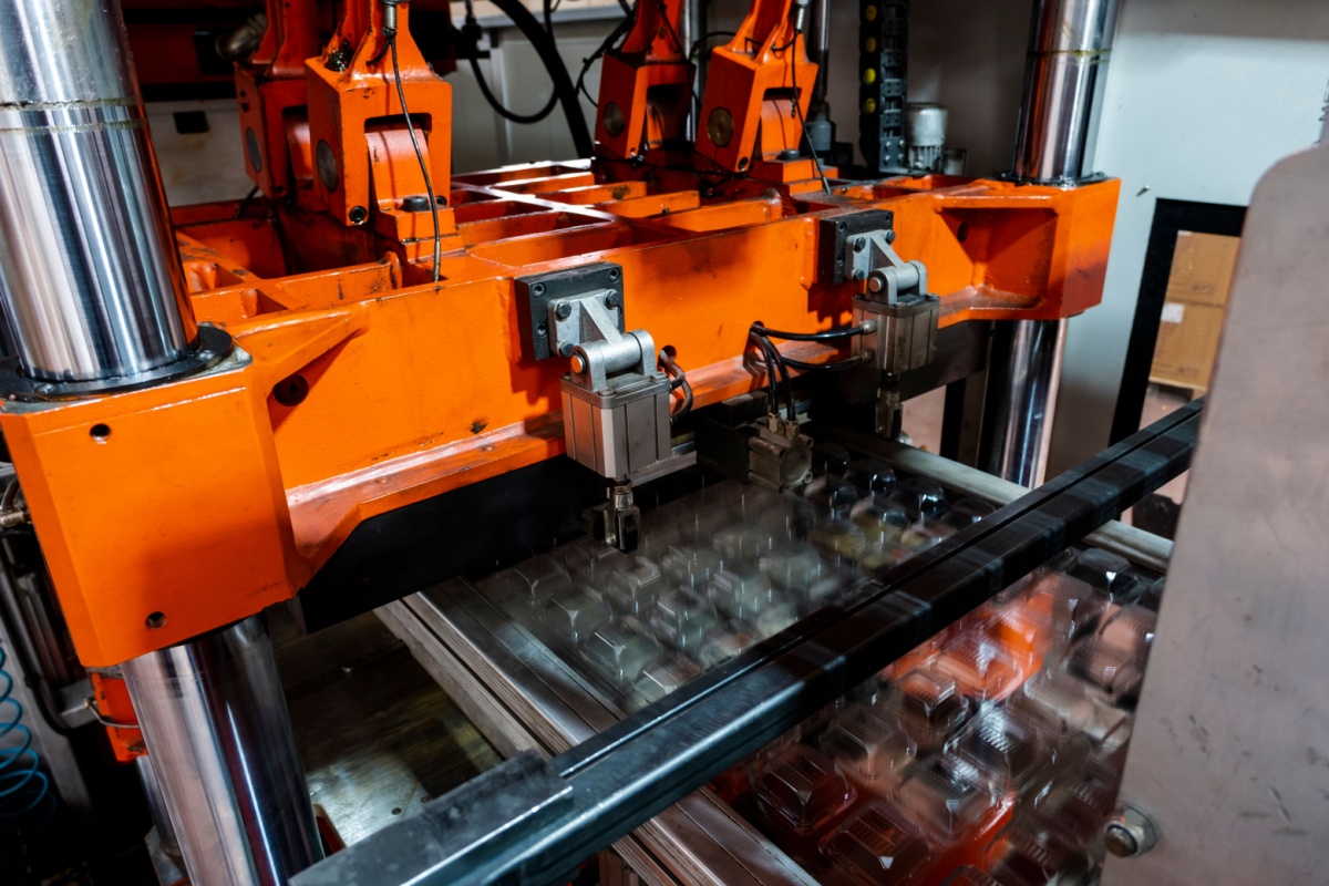 a thermoforming machine making plastic packaging